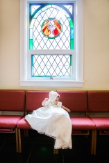 portrait of baby girl in white gown during christining by jessica michelle photo
